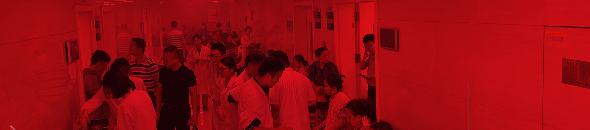 The typical busy waiting and treatment areas in the hallway of the Acupuncture Department at Anhui University of Chinese Medicine Hospital