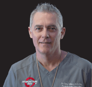 “Dr. Tony Willcox performing acupuncture at Acupuncture Zen in Delray Beach, blending traditional Chinese medicine with advanced therapies like K-Laser and NovoTHOR red light therapy.”