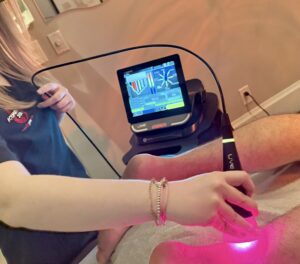 Targeted K-Laser 100W treatment on Achilles tendon and calf for injury recovery, Acupuncture Zen Delray Beach